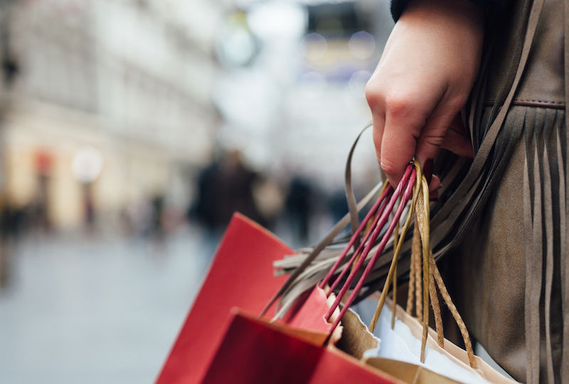 Closeup of woman holding shopiing bags